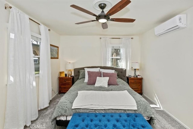 carpeted bedroom featuring a wall mounted air conditioner and ceiling fan