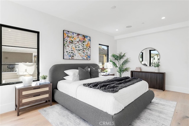 bedroom with light wood-type flooring