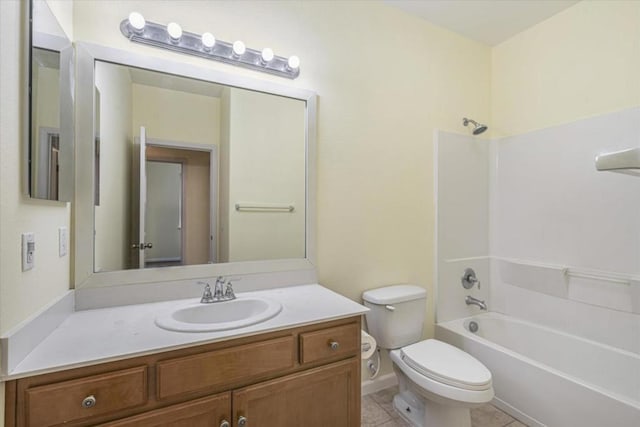 full bathroom featuring tile patterned flooring, vanity, bathtub / shower combination, and toilet