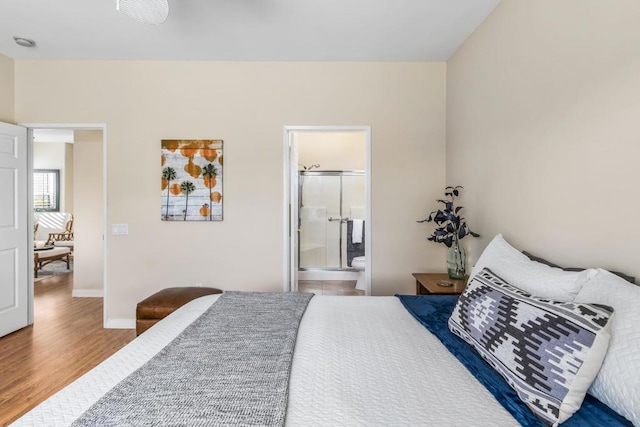 bedroom with hardwood / wood-style flooring