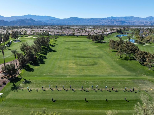 view of property's community featuring a water and mountain view