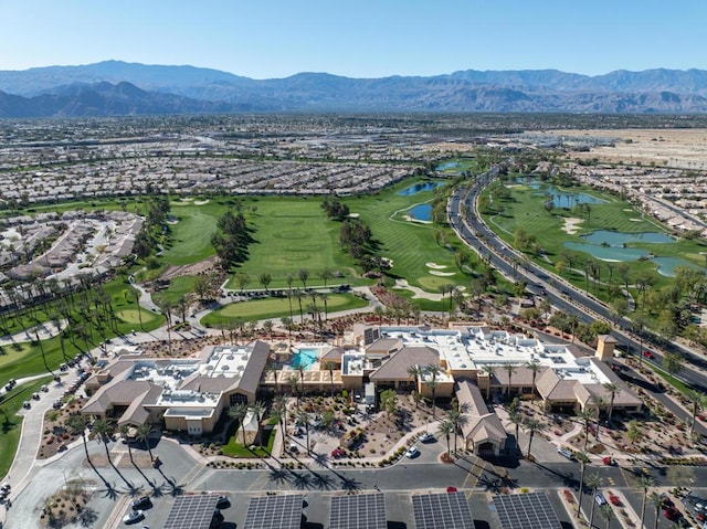 bird's eye view with a water and mountain view