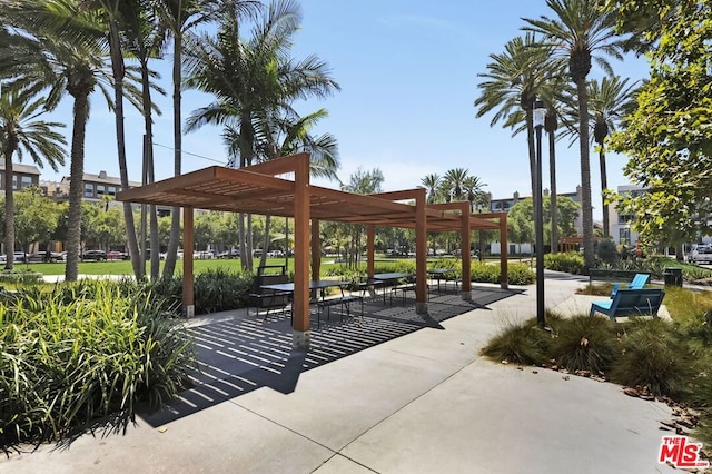 view of home's community featuring a pergola