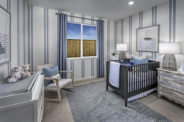 bedroom featuring dark carpet