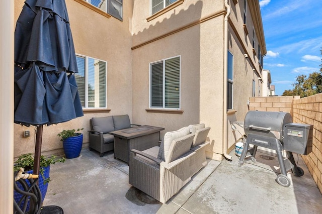 view of patio / terrace with an outdoor living space and grilling area