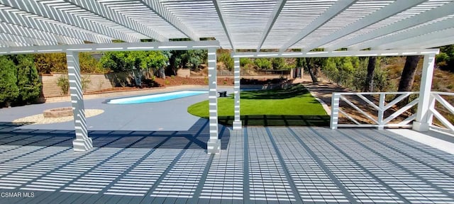 exterior space with a fenced in pool and a pergola