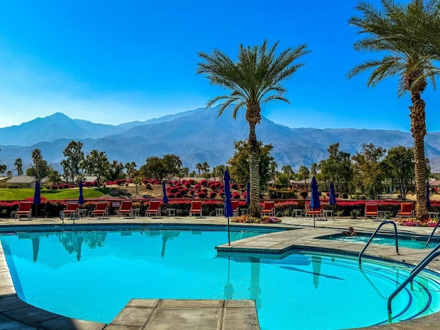 view of pool with a mountain view