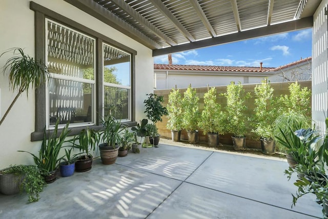 view of patio featuring a pergola