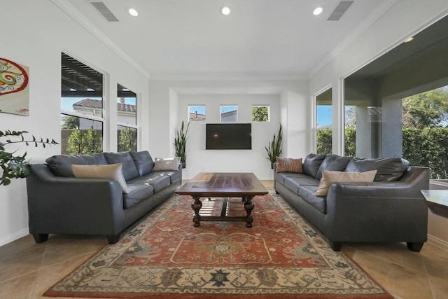 living room with crown molding and tile patterned floors