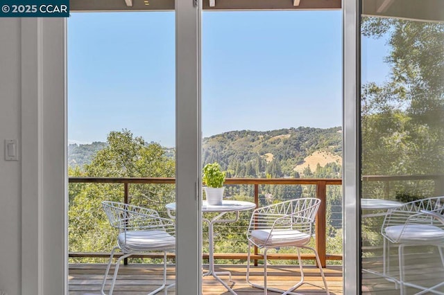 balcony featuring a mountain view