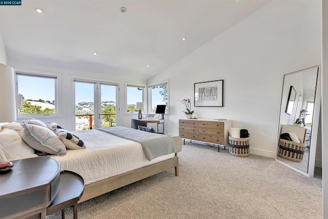 bedroom featuring high vaulted ceiling, carpet floors, and multiple windows