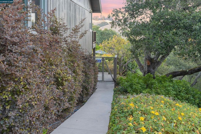 view of property exterior at dusk