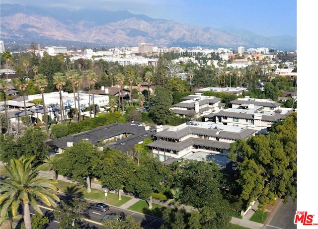 birds eye view of property featuring a mountain view