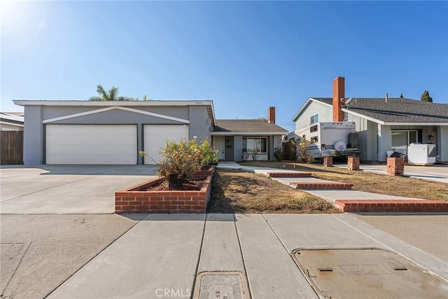 single story home with a garage