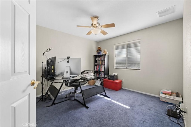 office space featuring ceiling fan and carpet floors