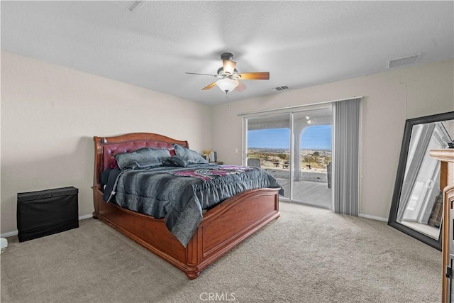 bedroom featuring ceiling fan, carpet flooring, and access to exterior