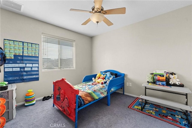 carpeted bedroom featuring ceiling fan