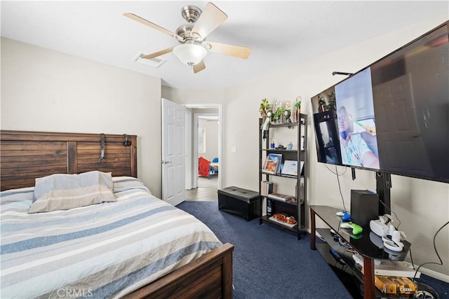 carpeted bedroom with ceiling fan