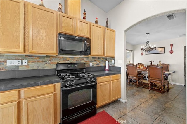 kitchen with pendant lighting, an inviting chandelier, black appliances, decorative backsplash, and light brown cabinets