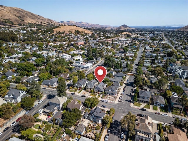 bird's eye view featuring a residential view and a mountain view