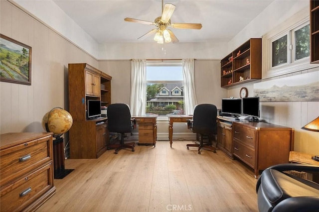 office area with ceiling fan and light wood-type flooring