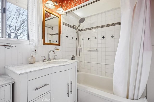 full bath featuring shower / tub combo and vanity