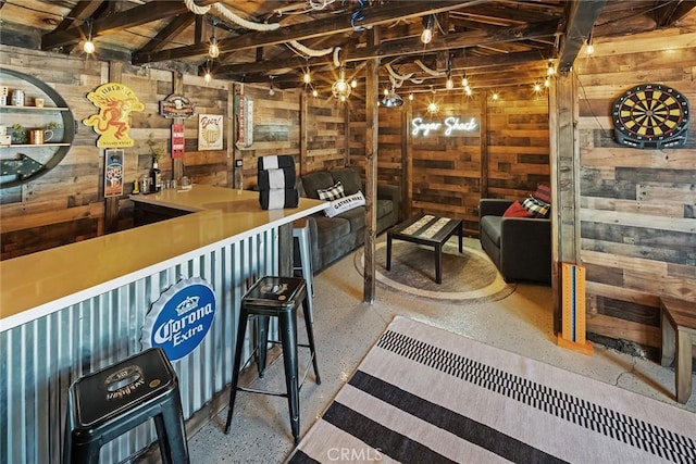 bar with beam ceiling and wood walls