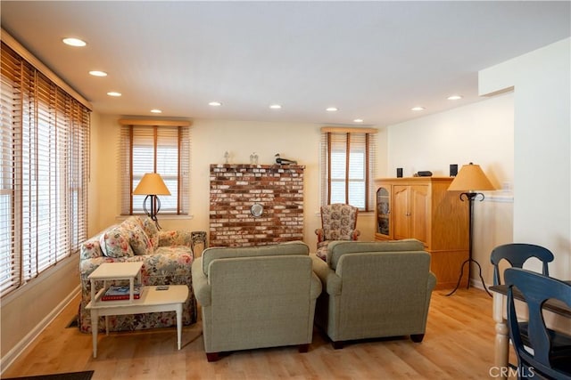 living room with light hardwood / wood-style flooring