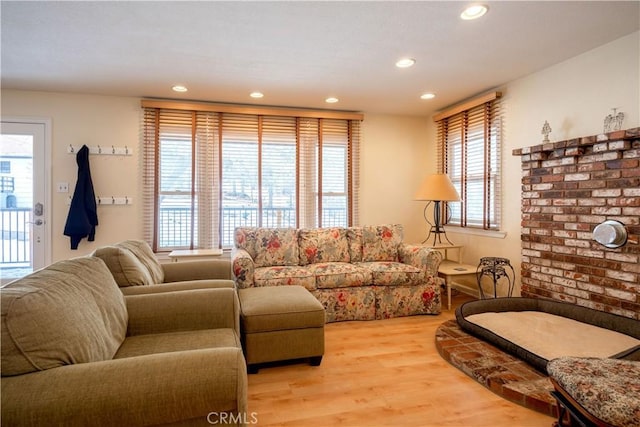 living room with hardwood / wood-style flooring and plenty of natural light