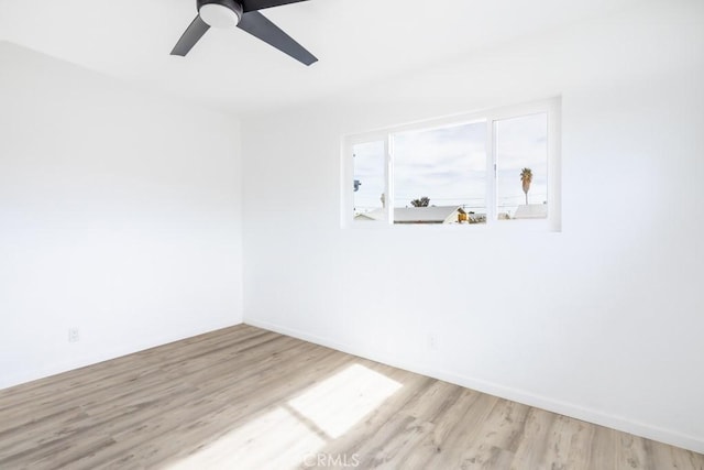 unfurnished room with light hardwood / wood-style floors and ceiling fan