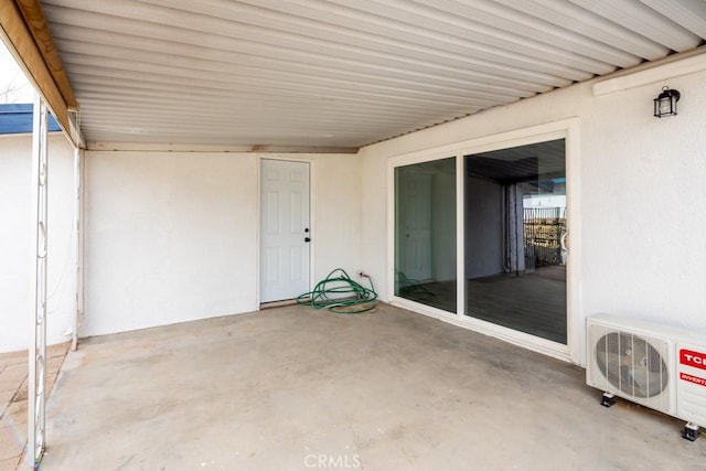 view of patio featuring ac unit