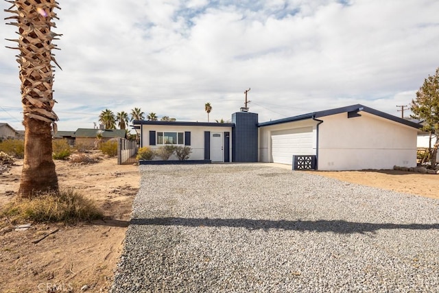 ranch-style house with a garage