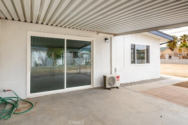 view of patio with ac unit