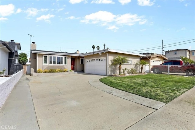 single story home featuring a garage and a front yard