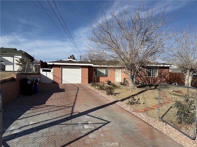 single story home with a garage