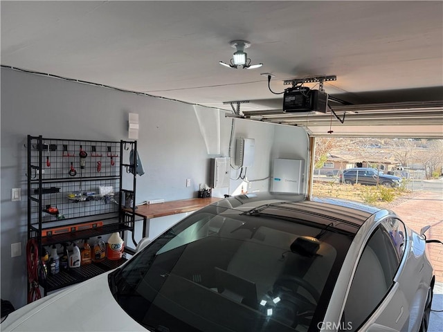 garage featuring a garage door opener