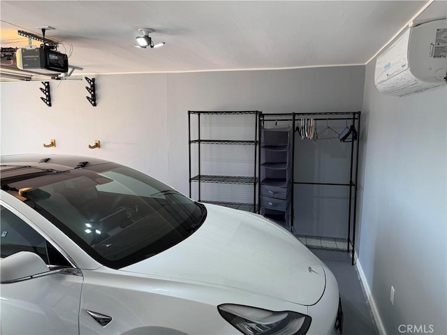 garage featuring a garage door opener and a wall unit AC