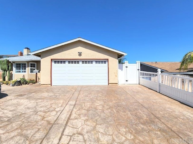 ranch-style home with a garage