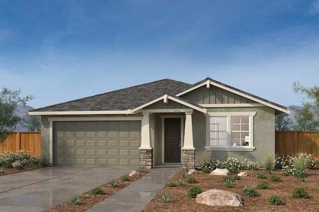 view of front of property with a garage