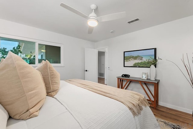 bedroom featuring ceiling fan and hardwood / wood-style floors