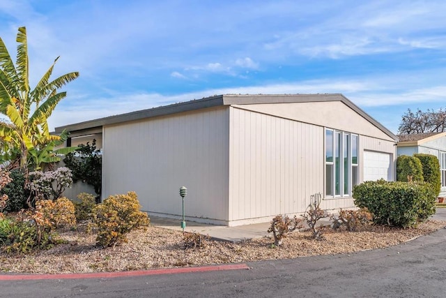 view of home's exterior featuring a garage