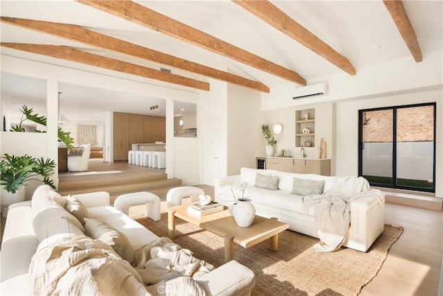 living room with a wall unit AC and beamed ceiling