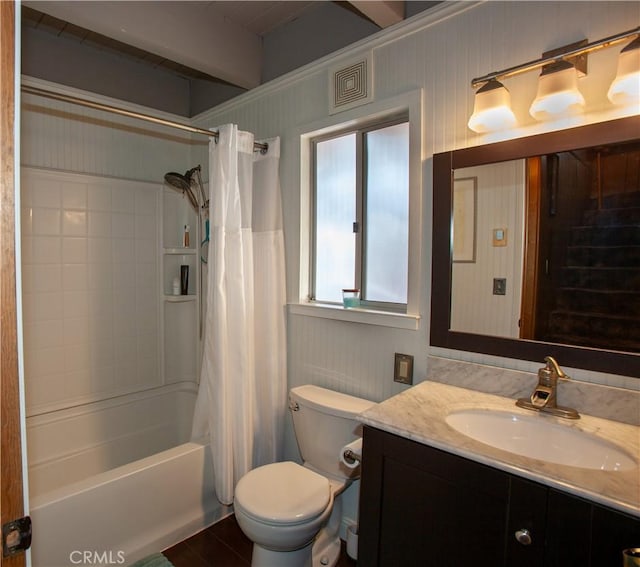 full bathroom featuring shower / bathtub combination with curtain, vanity, and toilet