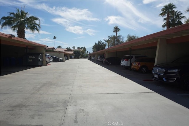 view of parking with a carport