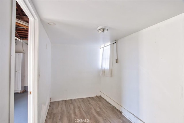 basement featuring light hardwood / wood-style floors