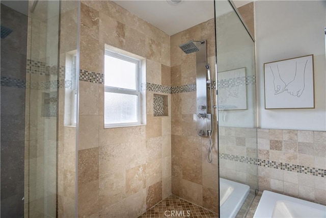 bathroom featuring independent shower and bath and tile walls