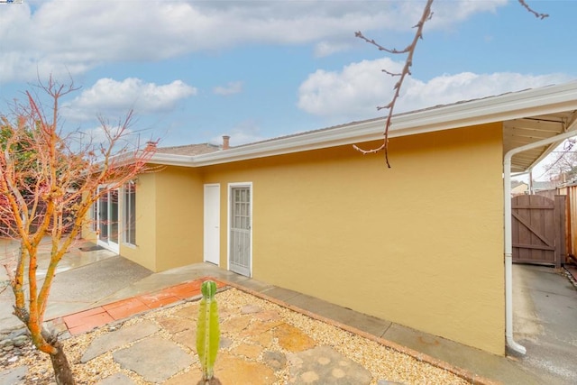 view of property exterior featuring a patio