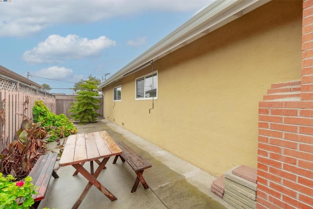 view of home's exterior with a patio area