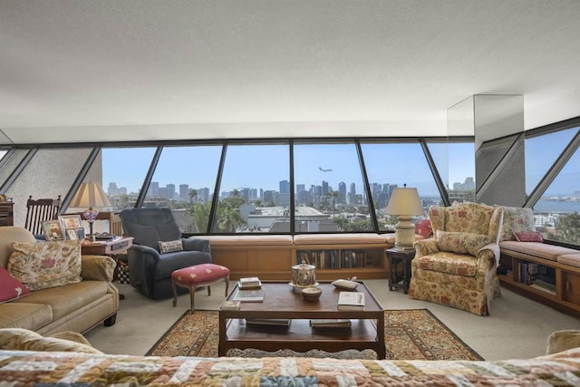 living room with a wealth of natural light and light colored carpet