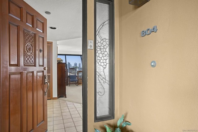 view of tiled foyer